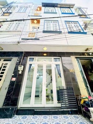 Nhà 2 lầu có sổ hồng cần bán