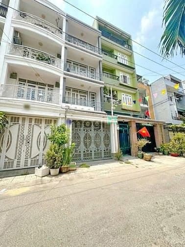 Xuất cảnh cần bán gấp nhà 4 lầu đẹp hẻm xe hơi 62 Lăm Văn Bền Quận 7
