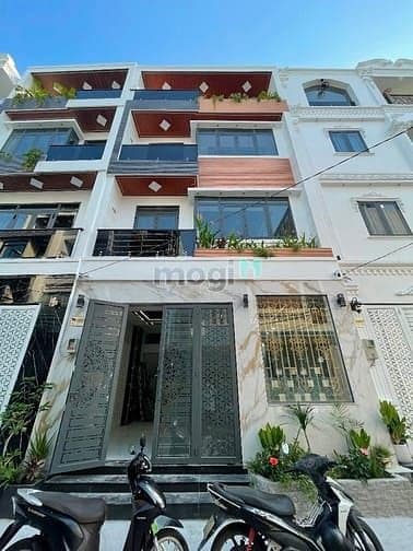 Nhà Phố XÂY DỰNG MỚI CÓ THANG MÁY - Đường thông 8m 2279 Huỳnh Tấn Phát